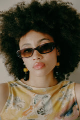 Océan Félin – Lunettes de Soleil Élégance